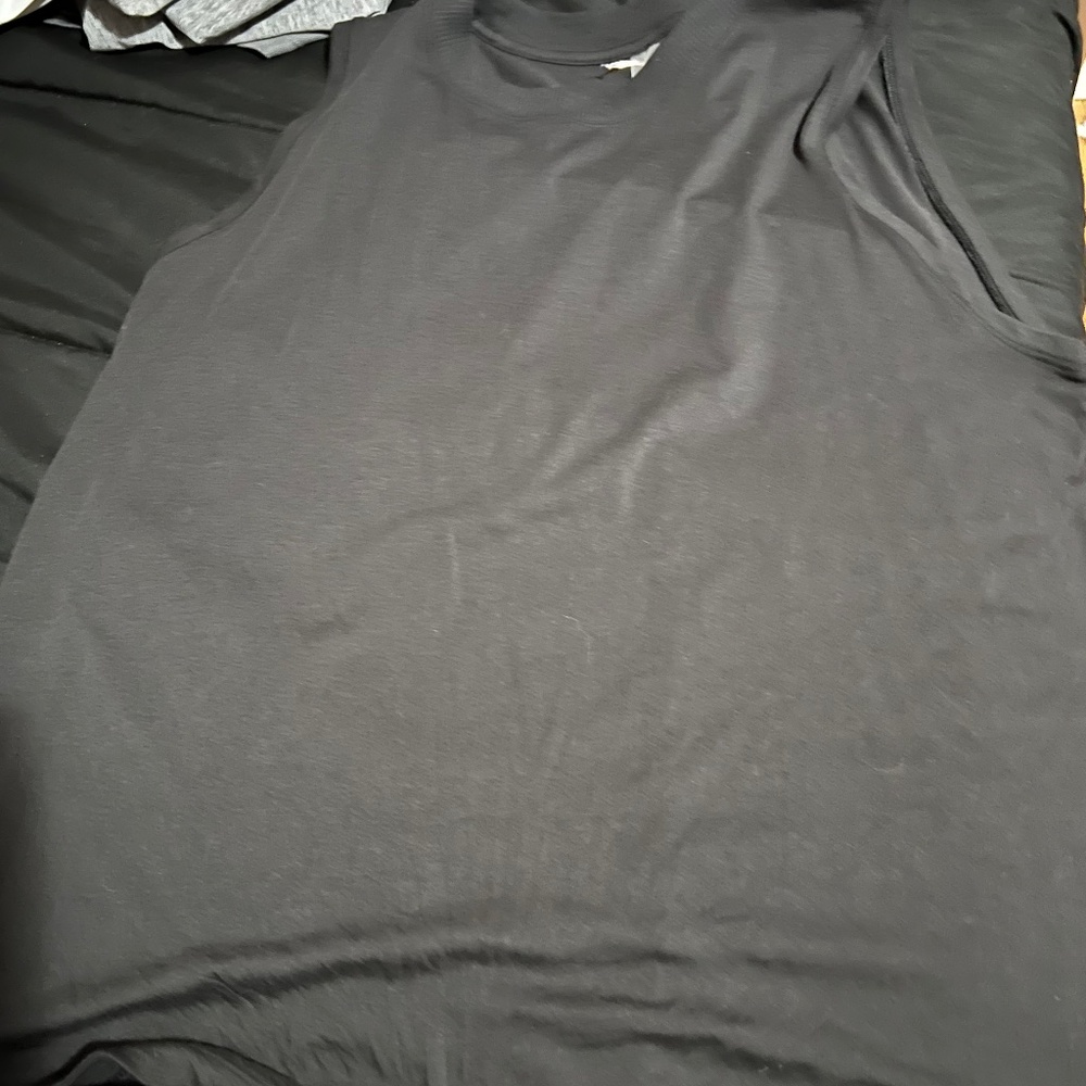 Woman’s black tank top